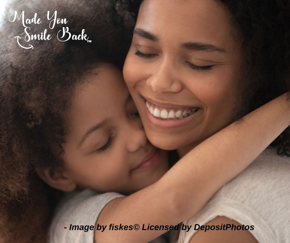 Image of a daughter hugging her mother tightly - 40 Quotes About Kindness for Kids - Mae You Smile Back